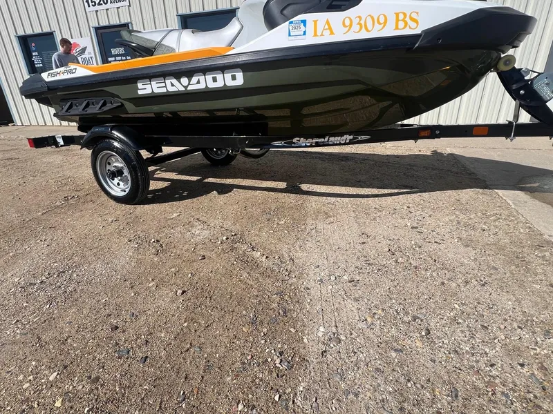Slide: The Image of 2019 Sea-Doo Fish Pro 155 on trailer, parked outside a building. - 20