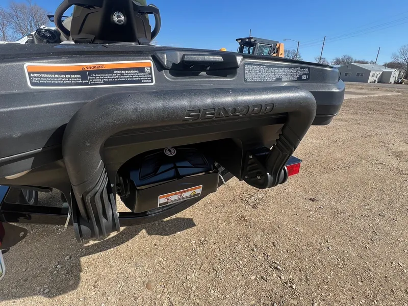 Slide: The Image of 2019 Sea-Doo Fish Pro 155 rear view, showcasing the boarding step and warning labels. - 5