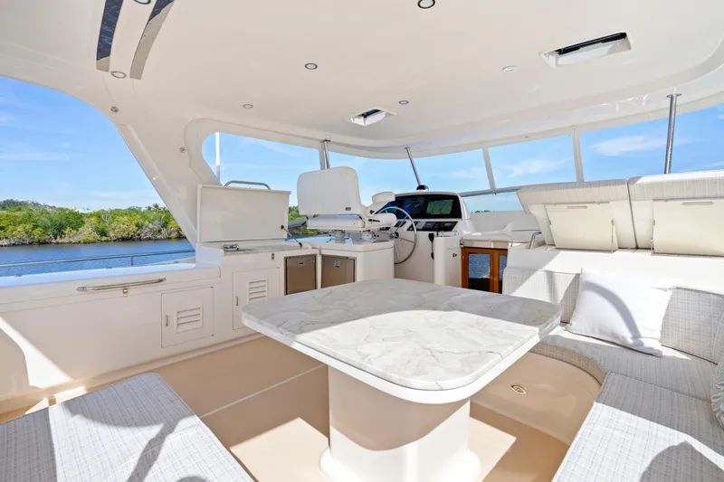Slide: The Image of Luxurious interior of 2023 Fleming 65 yacht with elegant seating and modern amenities. - 34