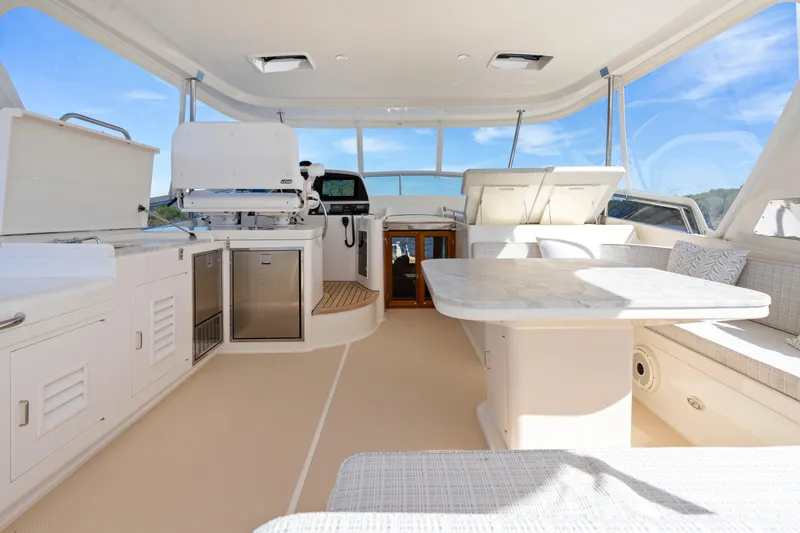 Slide: The Image of Luxurious interior of 2023 Fleming 65 yacht with modern amenities and elegant design. - 37