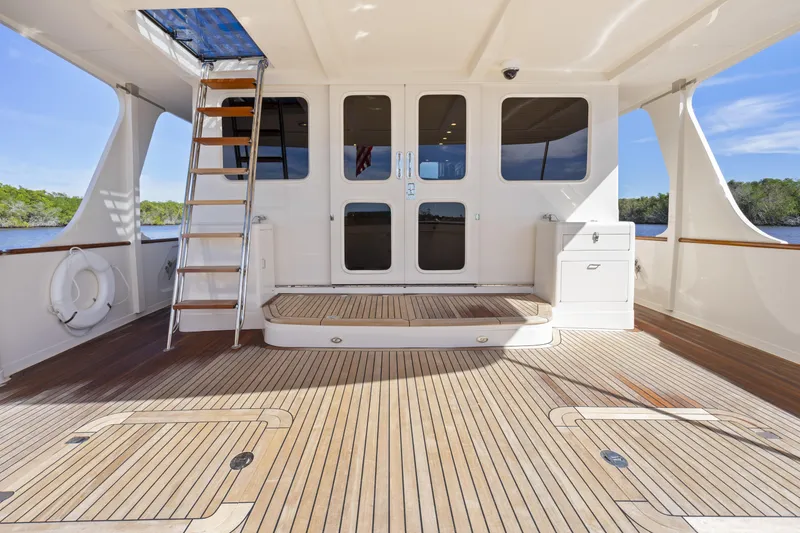 Slide: The Image of Spacious deck of 2023 Fleming 65 yacht with wooden flooring and modern design. - 47