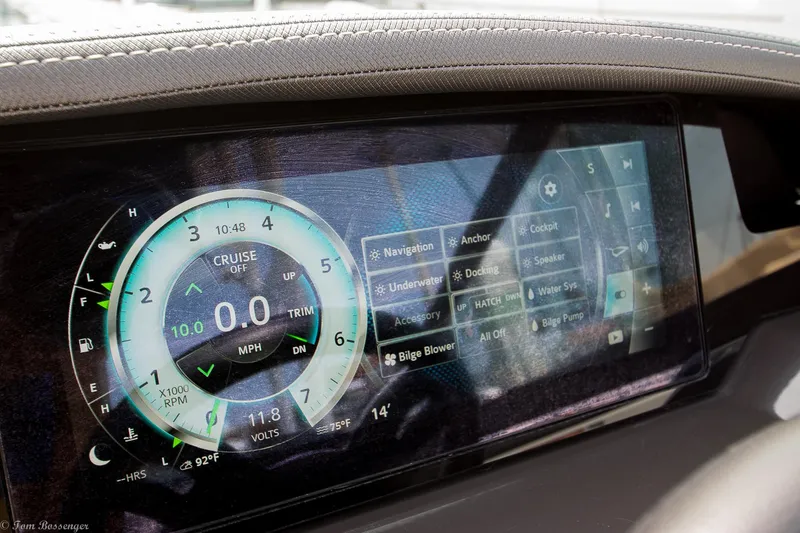 Slide: The Image of Digital dashboard of a 2020 Monterey M4 boat displaying navigation and system controls. - 18