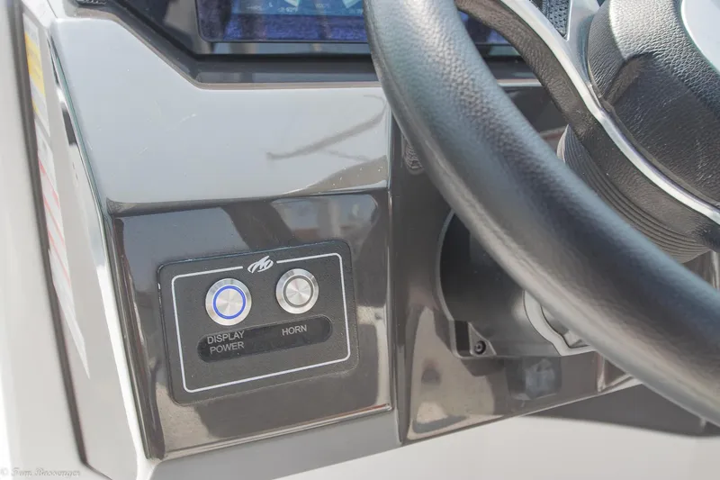 Slide: The Image of Dashboard controls of a 2020 Monterey M4 boat, featuring display power and horn buttons. - 19