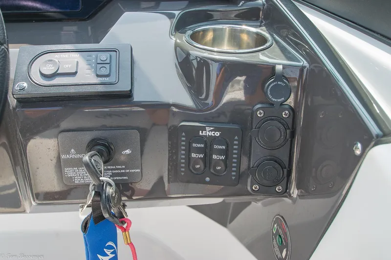 Slide: The Image of Control panel of a 2020 Monterey M4 boat with cup holder and switches. - 20