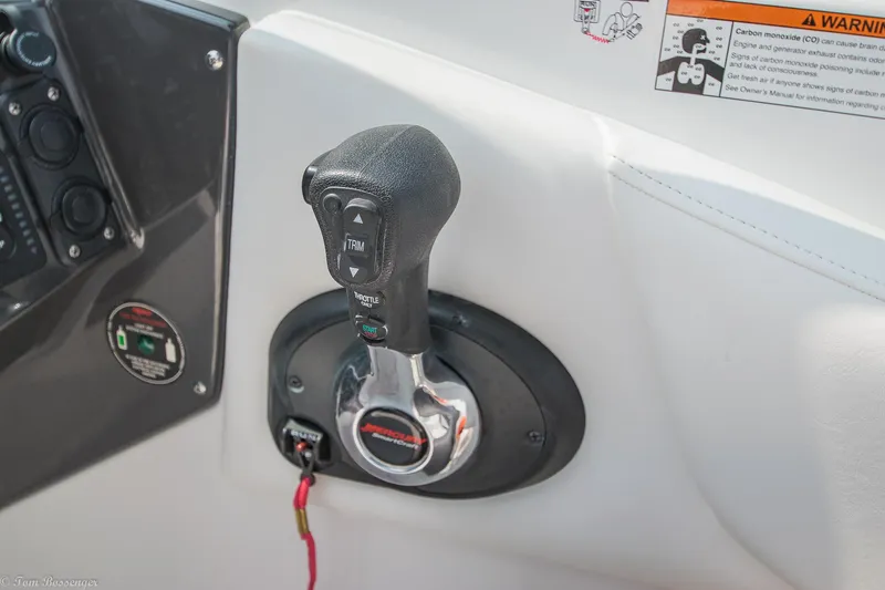 Slide: The Image of Throttle control of a 2020 Monterey M4 boat with warning labels. - 21