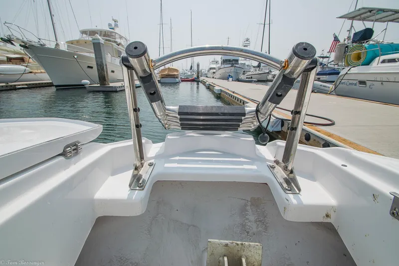 Slide: The Image of 2020 Monterey M4 boat docked in a marina with other yachts. - 28