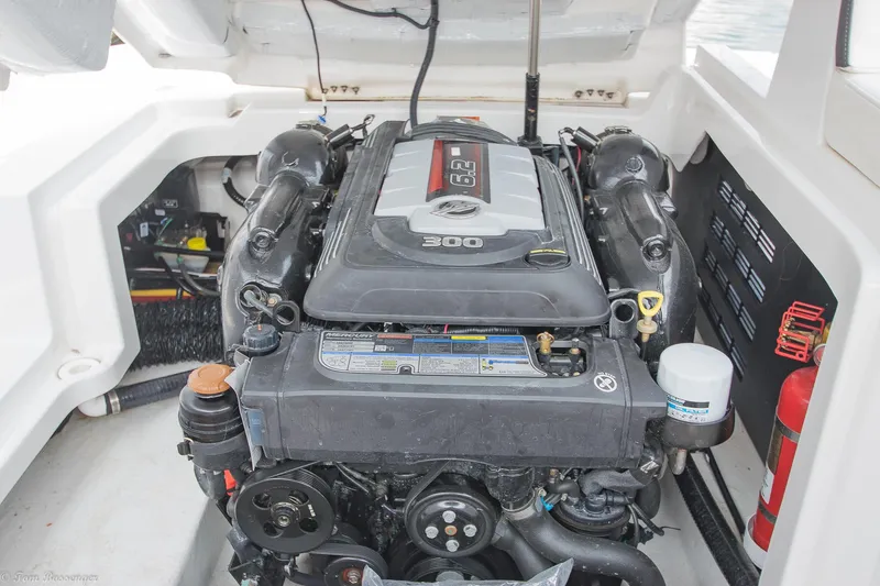 Slide: The Image of Engine compartment of a 2020 Monterey M4 boat, showcasing a powerful inboard motor. - 29