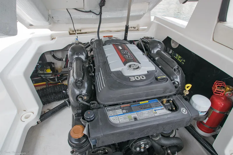 Slide: The Image of Engine compartment of a 2020 Monterey M4 boat, featuring a powerful inboard motor. - 31