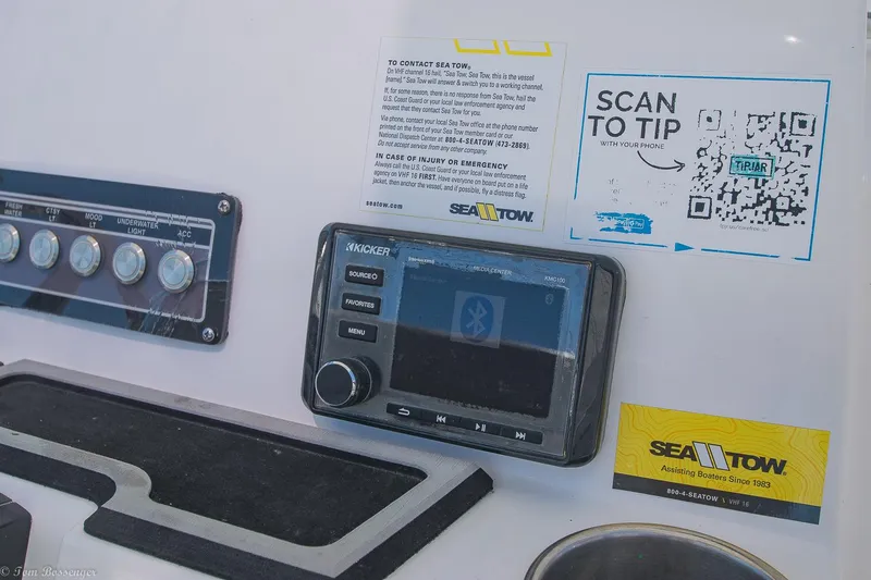 Slide: The Image of Control panel of a 2021 Sea Fox 248 Commander boat with Sea Tow information. - 14