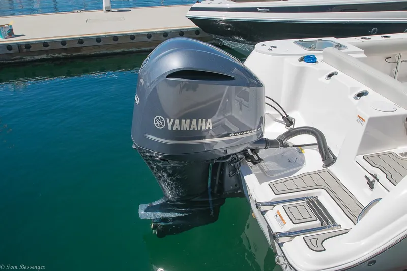 Slide: The Image of 2021 Sea Fox 248 Commander with Yamaha outboard motor docked in marina. - 28