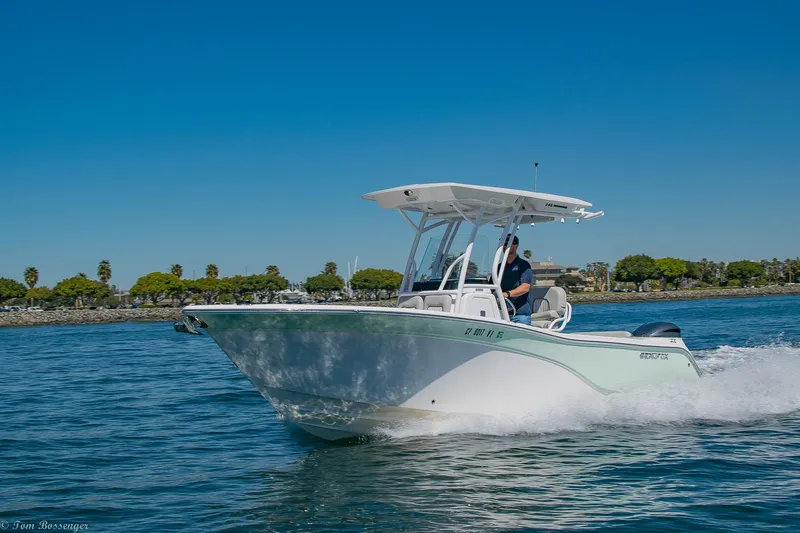 Slide: The Image of 2021 Sea Fox 248 Commander boat cruising on a sunny day. - 35