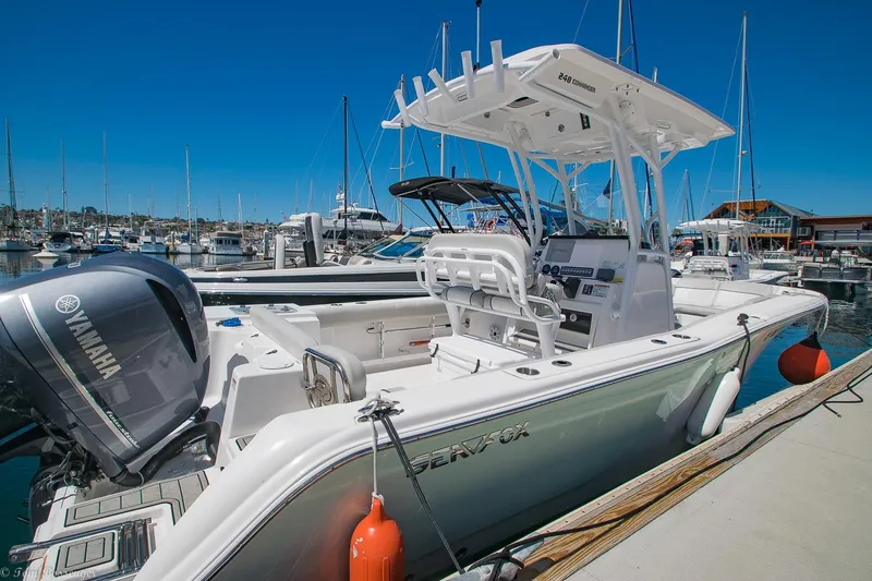 Slide: The Image of 2021 Sea Fox 248 Commander boat docked at marina with Yamaha engine. - 6