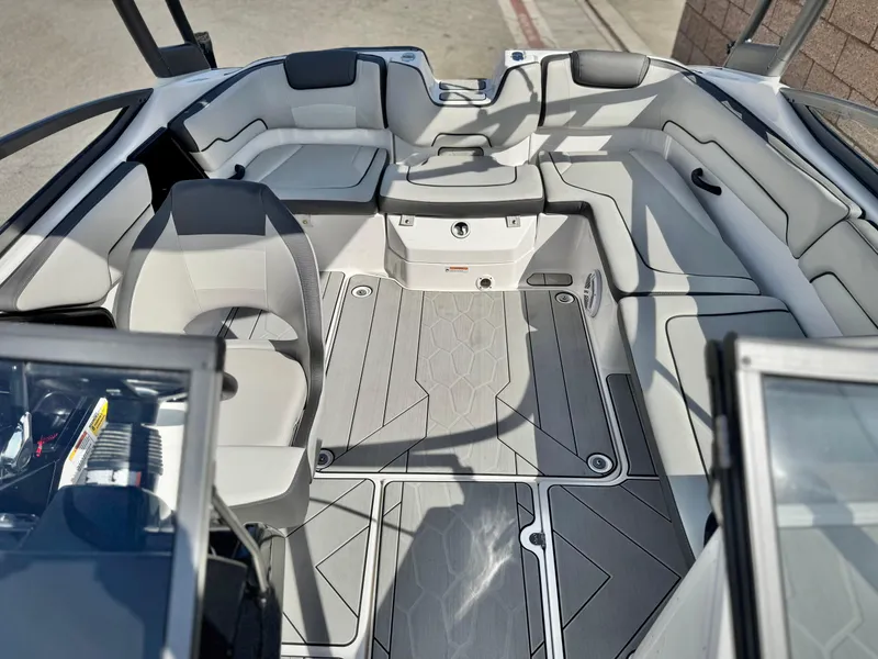 Slide: The Image of 2022 Yamaha Boats AR 190 interior with sleek seating and modern design. - 15