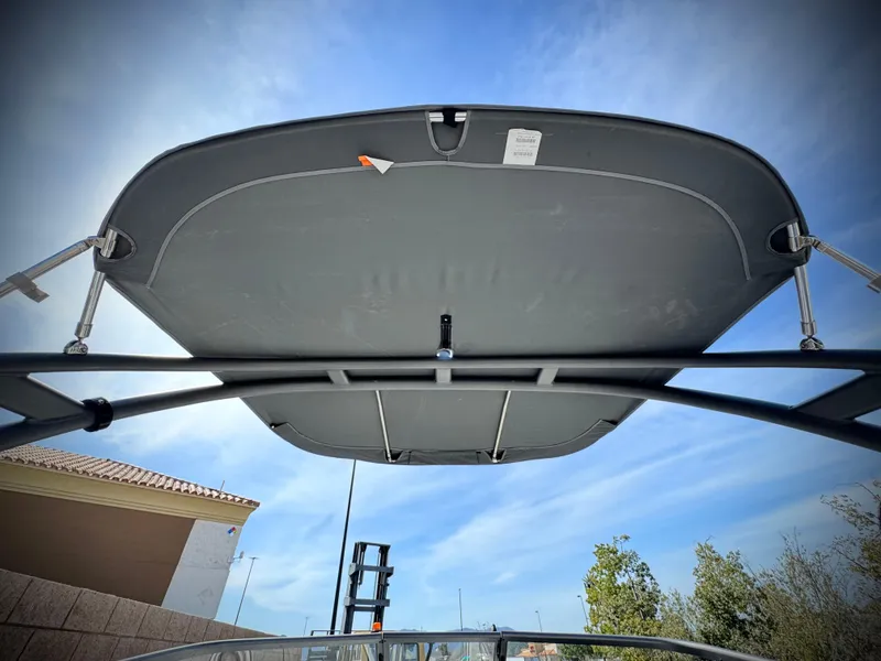 Slide: The Image of 2022 Yamaha Boats AR 190 bimini top against a clear blue sky. - 9