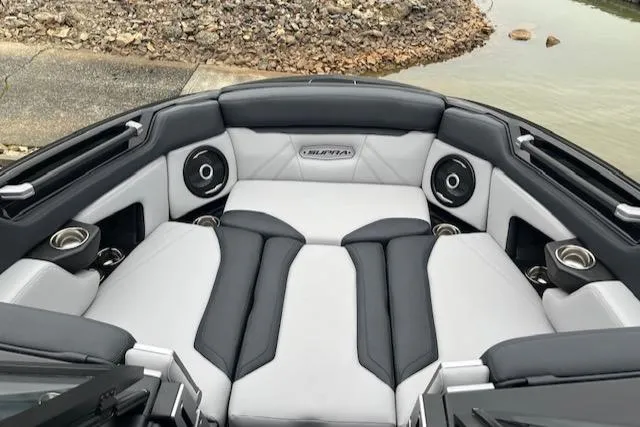 Slide: The Image of 2025 Supra SL boat interior with luxurious seating and built-in speakers. - 9