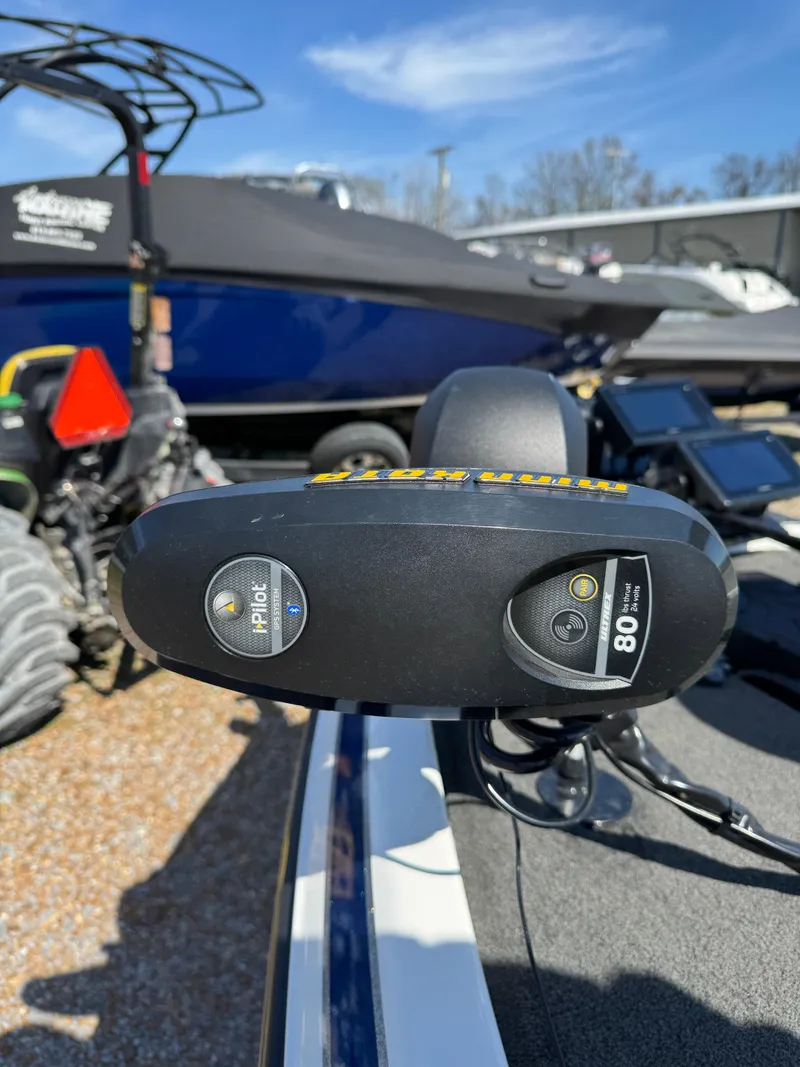 Slide: The Image of 2016 Skeeter ZX 225 boat with trolling motor, parked outdoors. - 15