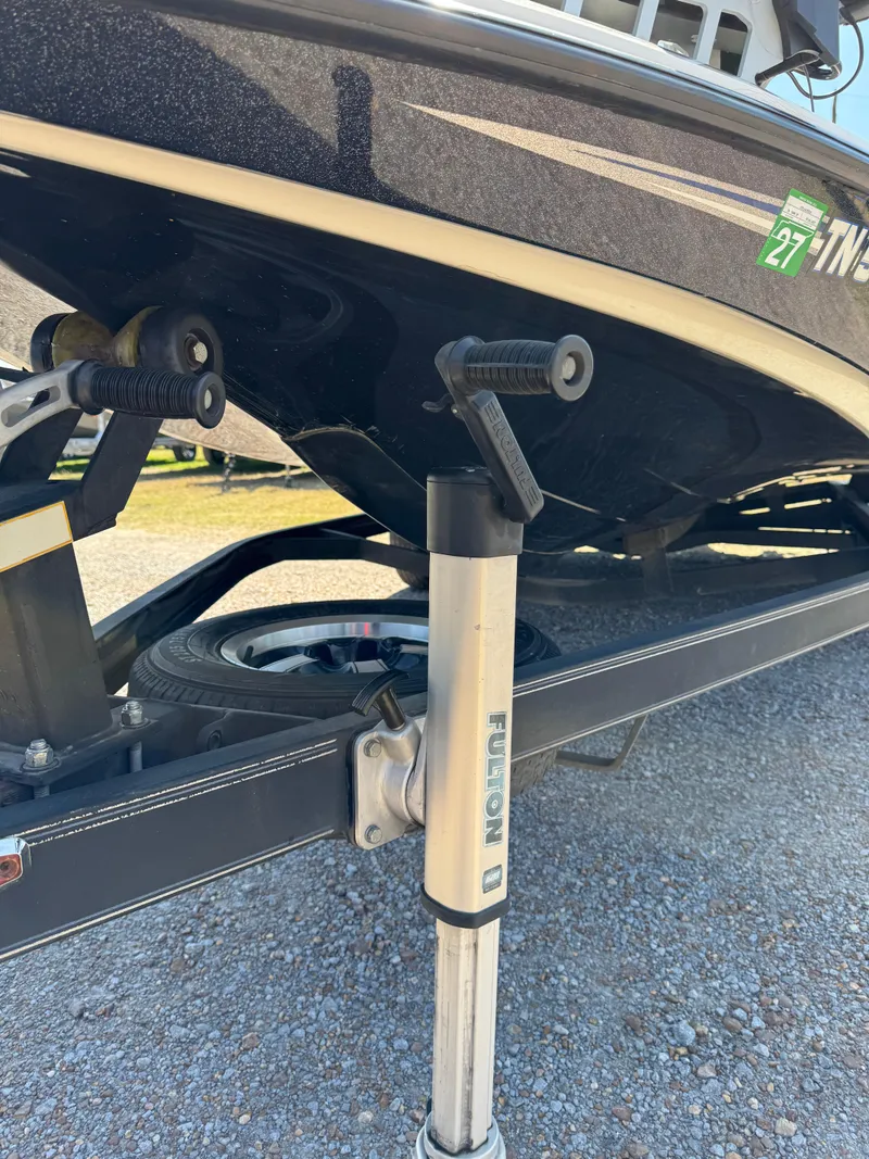 Slide: The Image of 2016 Skeeter ZX 225 boat on trailer with support jack. - 24