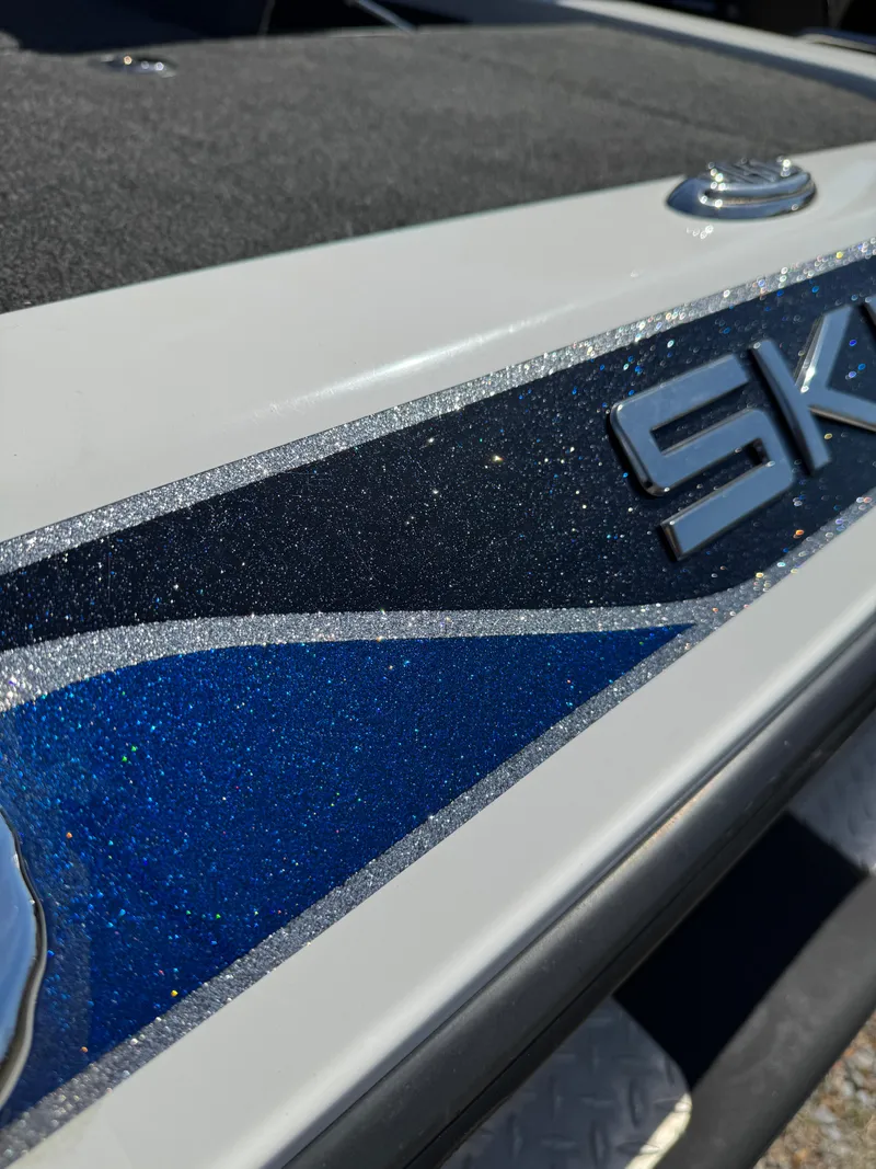 Slide: The Image of 2016 Skeeter ZX 225 boat with metallic blue and silver detailing. - 4