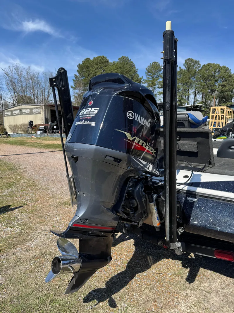 Slide: The Image of 2016 Skeeter ZX 225 boat with Yamaha engine, parked outdoors on a sunny day. - 6
