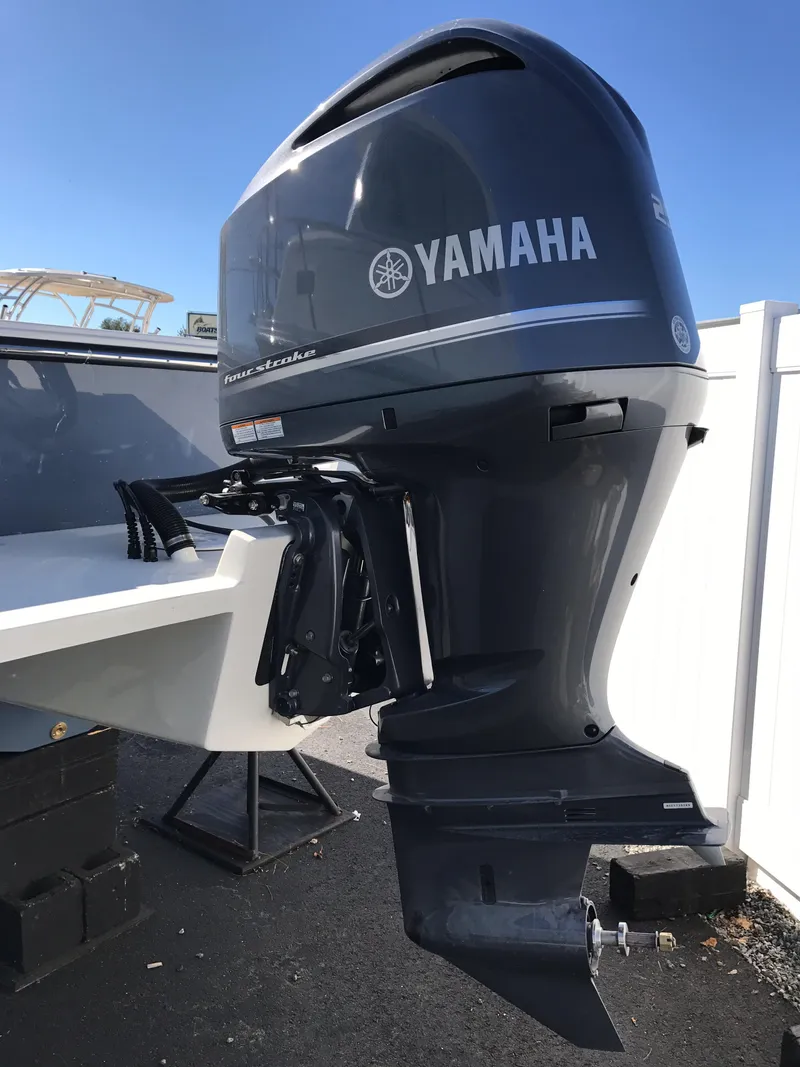 Slide: The Image of 2019 Parker 2320 SL Sport Cabin with Yamaha outboard motor. - 5