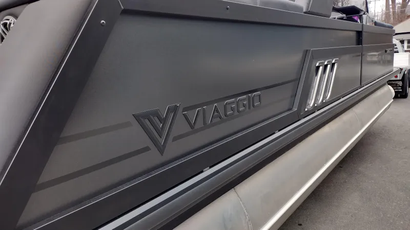 Slide: The Image of 2025 Viaggio Diamante boat side view with sleek design and logo. - 11