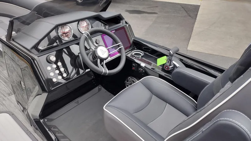 Slide: The Image of 2025 Viaggio Diamante boat cockpit with modern steering and control panel. - 17