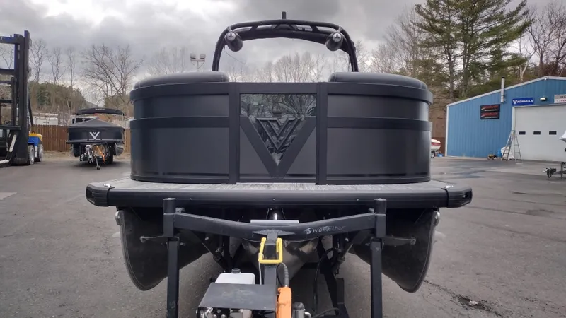 Slide: The Image of 2025 Viaggio Diamante boat on trailer, parked outdoors with overcast sky. - 3