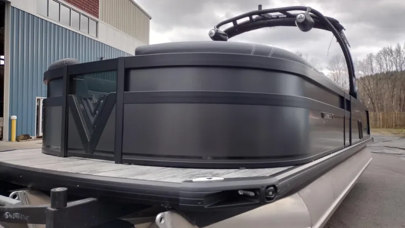 Slide: The Image of 2025 Viaggio Diamante pontoon boat with sleek black design and modern features. - 42