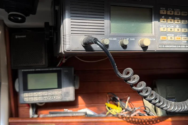 Slide: The Image of Radio equipment and controls inside a 1984 C&C 35 MK III sailboat. - 21