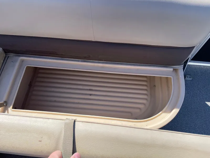 Slide: The Image of Storage compartment on a 2017 Sun Tracker BB18 boat seat. - 12