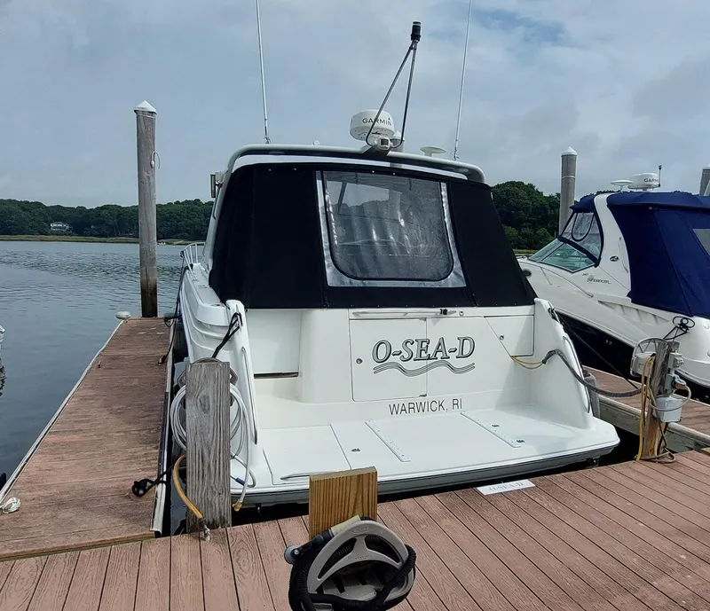 Slide: The Image of 1998 Formula 41 PC boat docked, rear view, with "O-SEA-D" name, Warwick, RI. - 1