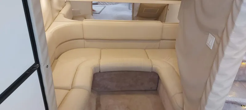 Slide: The Image of 1998 Formula 41 PC interior with beige leather seating and modern design. - 2