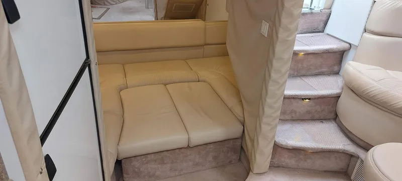 Slide: The Image of 1998 Formula 41 PC interior with beige seating and carpeted stairs. - 4