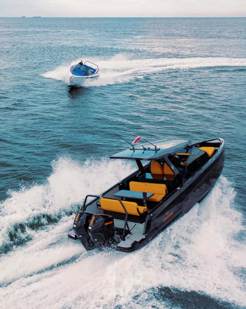 Slide: The Image of 2025 Virtue V10Top boats cruising on open water, showcasing sleek design and performance. - 17