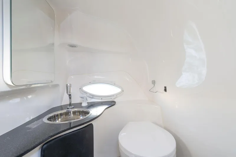 Slide: The Image of Modern bathroom in Hanover 305, 2025 model, featuring sleek sink and compact toilet design. - 11