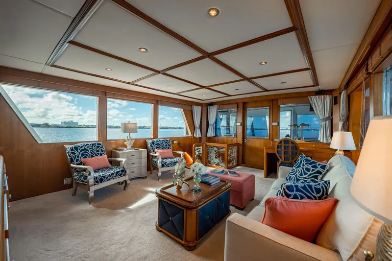 Slide: The Image of Luxurious interior of 1985 Cheoy Lee 90 Motor Yacht with elegant seating and ocean views. - 11