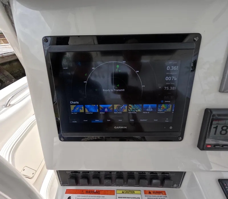 Slide: The Image of Garmin navigation display on 2013 Boston Whaler 320 Outrage boat dashboard. - 19