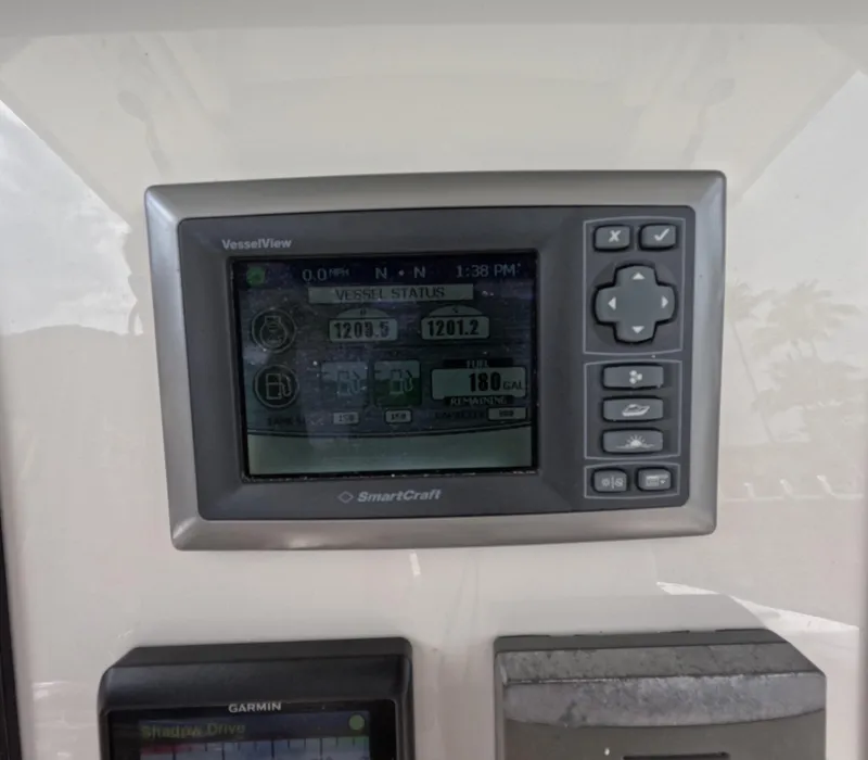 Slide: The Image of SmartCraft VesselView display on 2013 Boston Whaler 320 Outrage boat dashboard. - 9