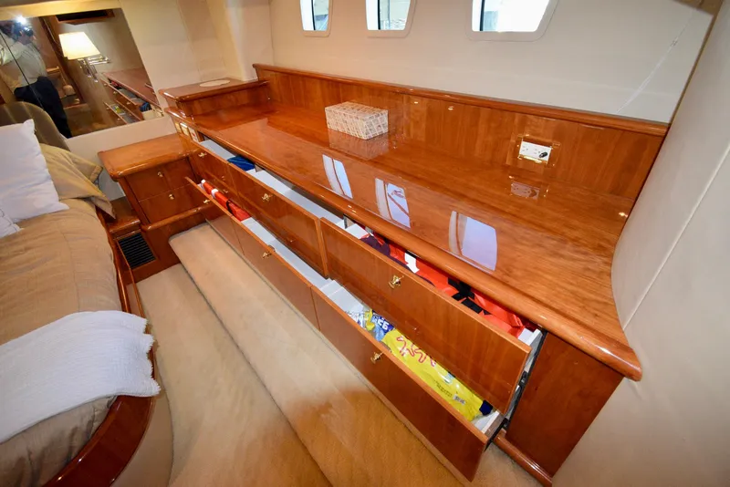 Slide: The Image of Luxurious Neptunus 58 yacht interior with polished wood cabinetry, 2010 model. - 14