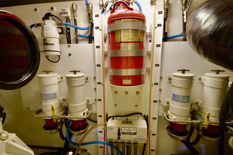 Slide: The Image of Engine room of 2010 Neptunus 58 yacht with fire extinguisher and filtration system. - 34