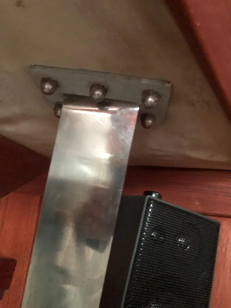 Slide: The Image of Metal bracket and speaker in 1984 Tartan T-33 interior. - 10