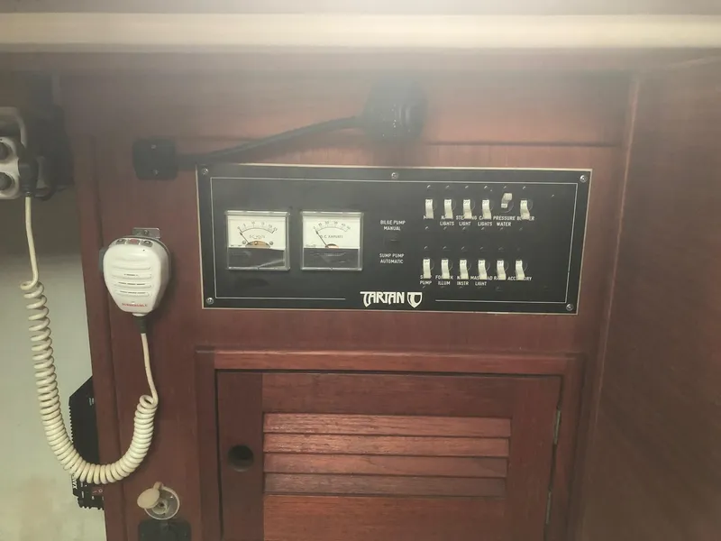 Slide: The Image of Electrical panel of a 1984 Tartan T-33 sailboat with gauges and switches. - 14