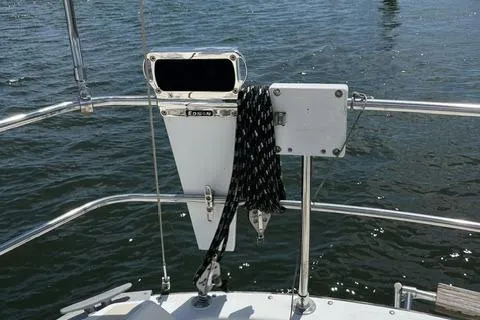 Slide: The Image of Sailboat deck with ropes and equipment, Tartan T-33, 1984 model, on water. - 4