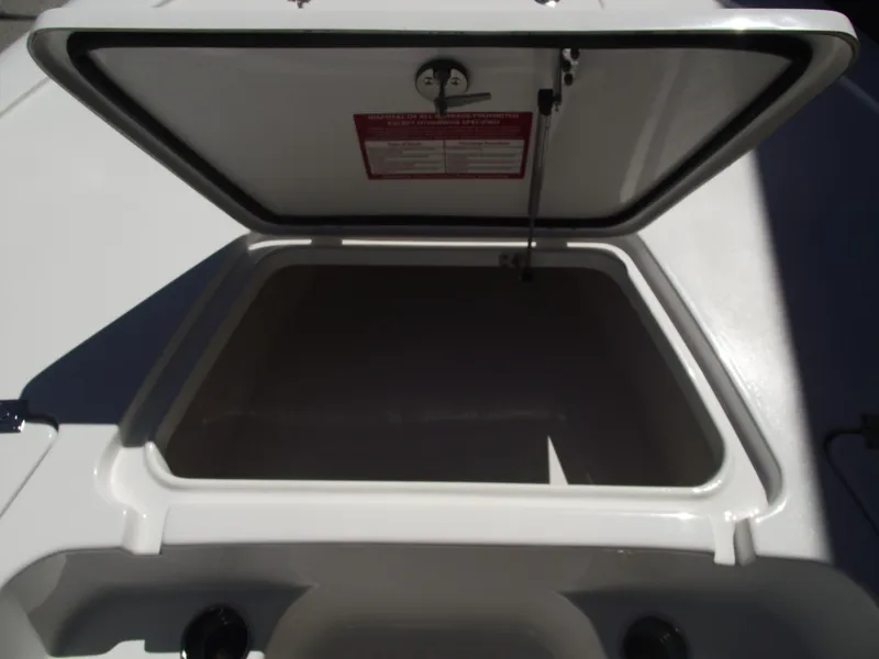 Slide: The Image of Open storage compartment on 2022 Tidewater 1910 Bay Max boat. - 10