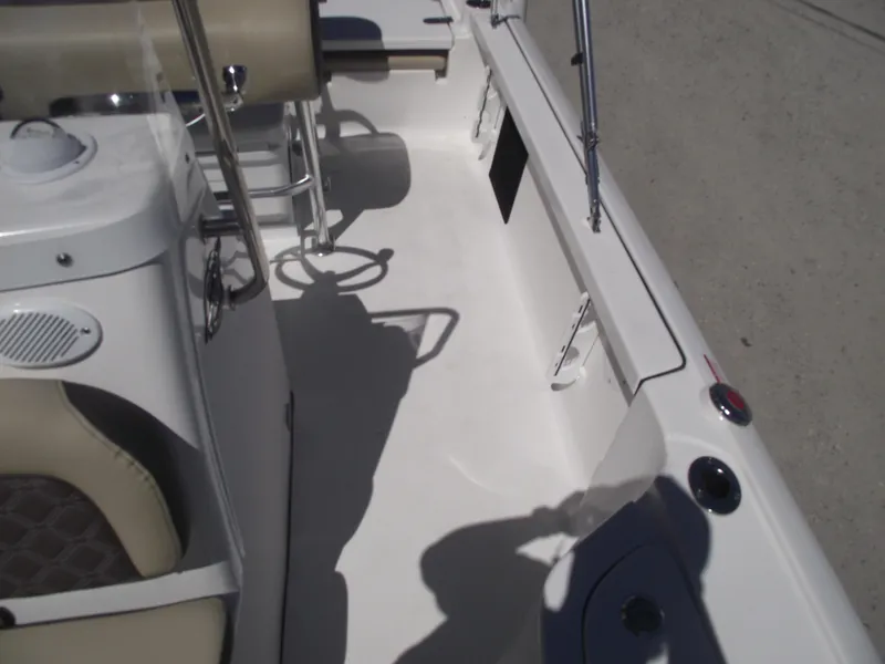 Slide: The Image of 2022 Tidewater 1910 Bay Max boat interior with seating and console. - 16