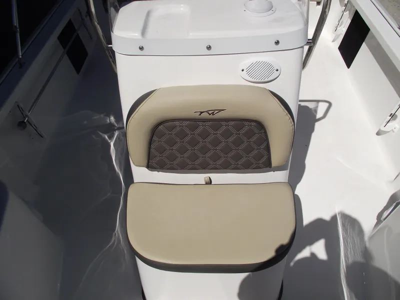 Slide: The Image of Tidewater 1910 Bay Max 2022 boat seat with beige and brown upholstery. - 19