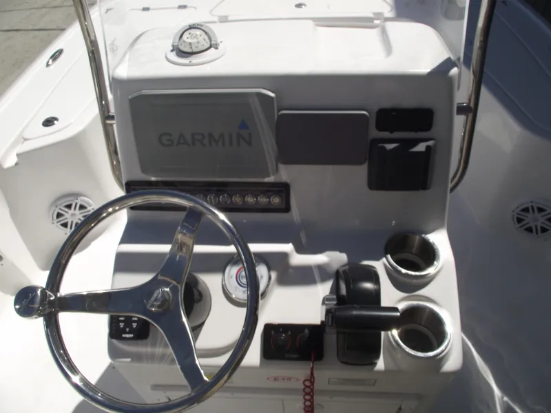 Slide: The Image of Steering console of 2022 Tidewater 1910 Bay Max boat with Garmin navigation system. - 22