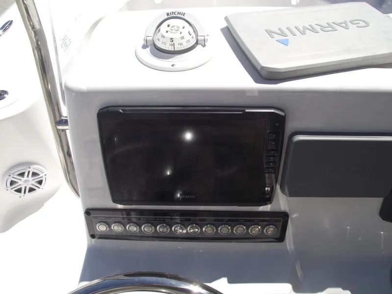 Slide: The Image of Control panel of 2022 Tidewater 1910 Bay Max boat with Garmin navigation system. - 23