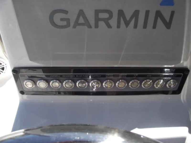 Slide: The Image of Control panel of 2022 Tidewater 1910 Bay Max boat with Garmin electronics. - 24