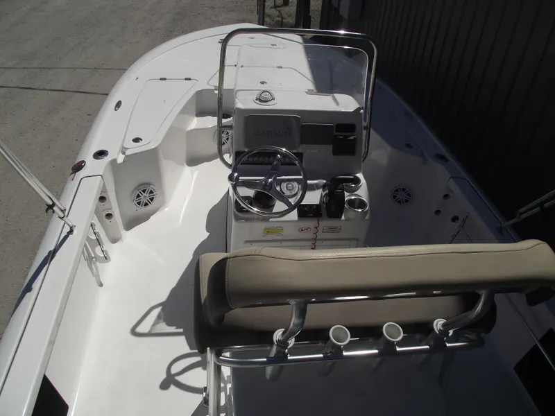 Slide: The Image of 2022 Tidewater 1910 Bay Max boat interior with steering console and seating. - 26
